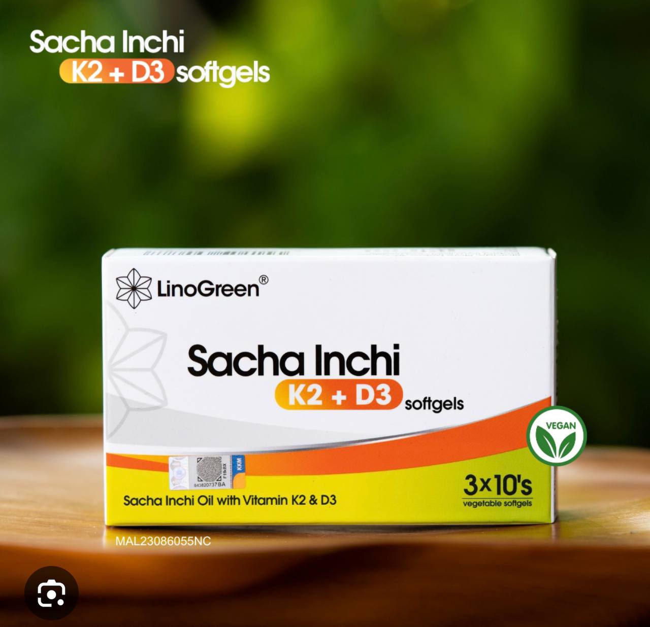 Box of Sacha Inchi K2 + D3 softgels with LinoGreen branding on a wooden surface.